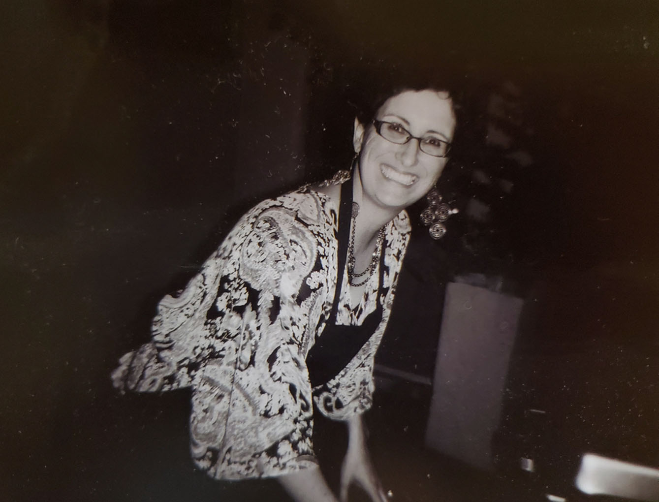 Marcela Davila-Barley in her beautifully styled kitchen, smiling warmly at the camera
